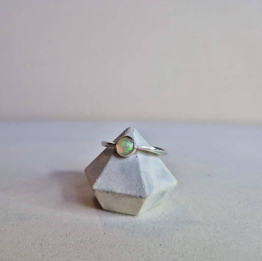 Tapered band with Ethiopian opal