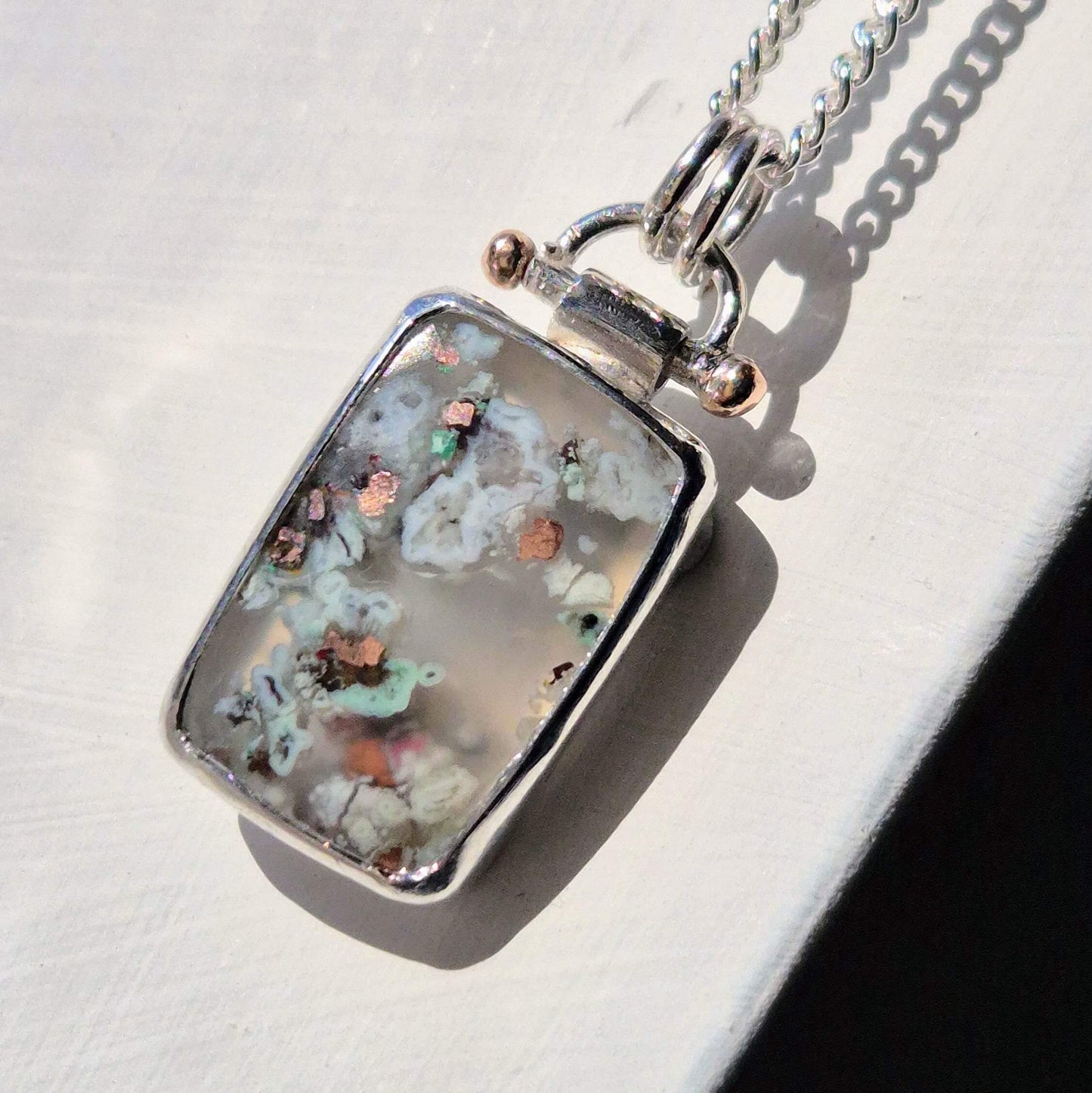 Confetti chrysocolla & Copper in Chalcedony Pendant